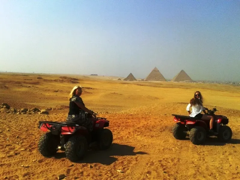 Sunset quad bike Giza Pyramids — golden hour ATV adventure Cairo